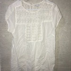 Beautiful white lace top with buttons on side ends